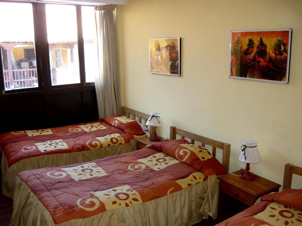 Hostal Quipu Cuzco Habitación foto